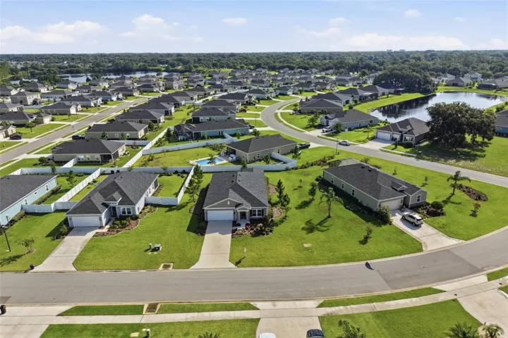 Aerial View of the front of this home showing the lovely community.