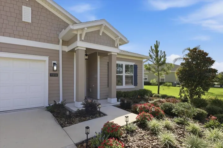 As you walk up the front walkway you can see how meticulously maintained this home is.