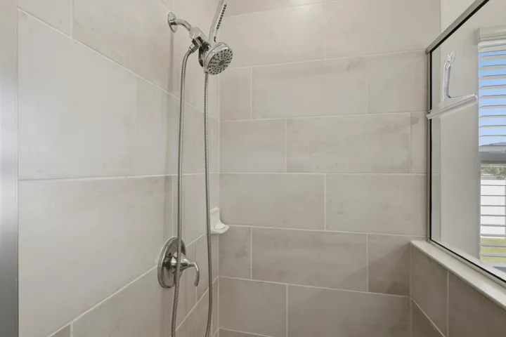 Shower Stall has fabulous large plank tiles.