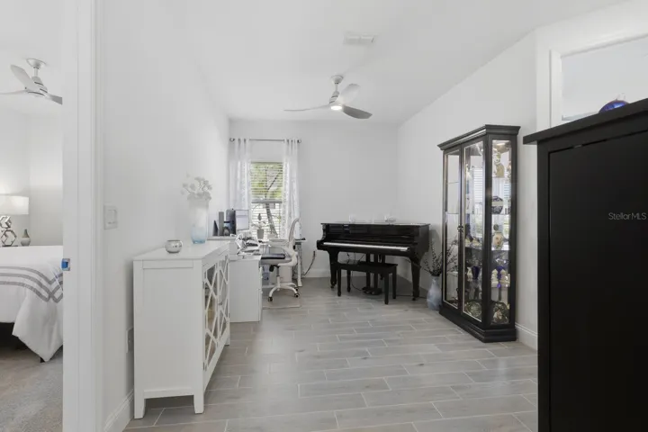 The Flex Space between Bedrooms 2 & 3 currently house a baby grand piano and an office space.