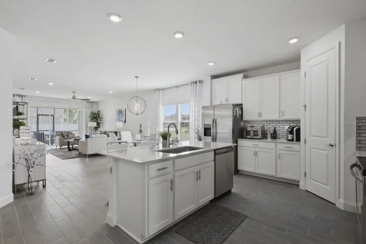 The open layout flows from the kitchen, past the dining area to the Great/Family Room.