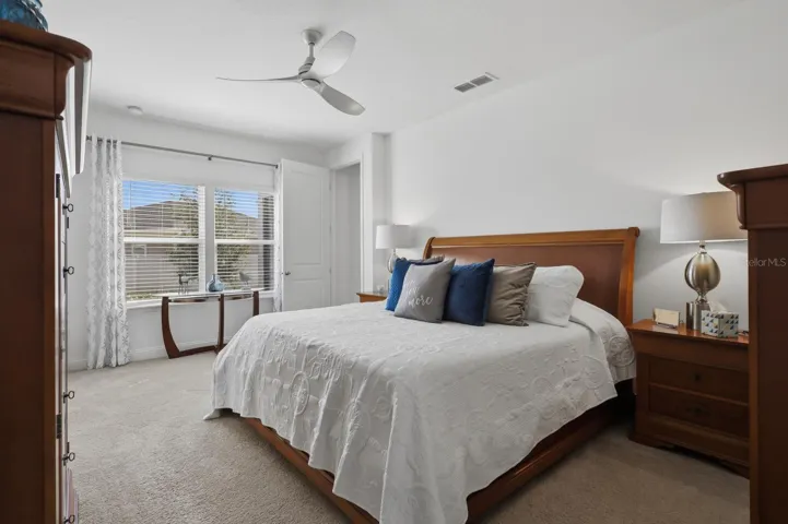 Another View of the primary bedroom towards the rear window.