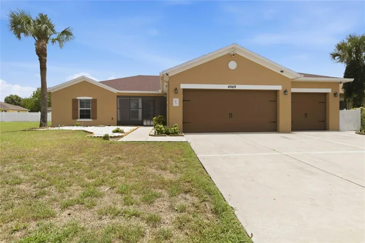 Exterior front, 3 car garage, fully fenced