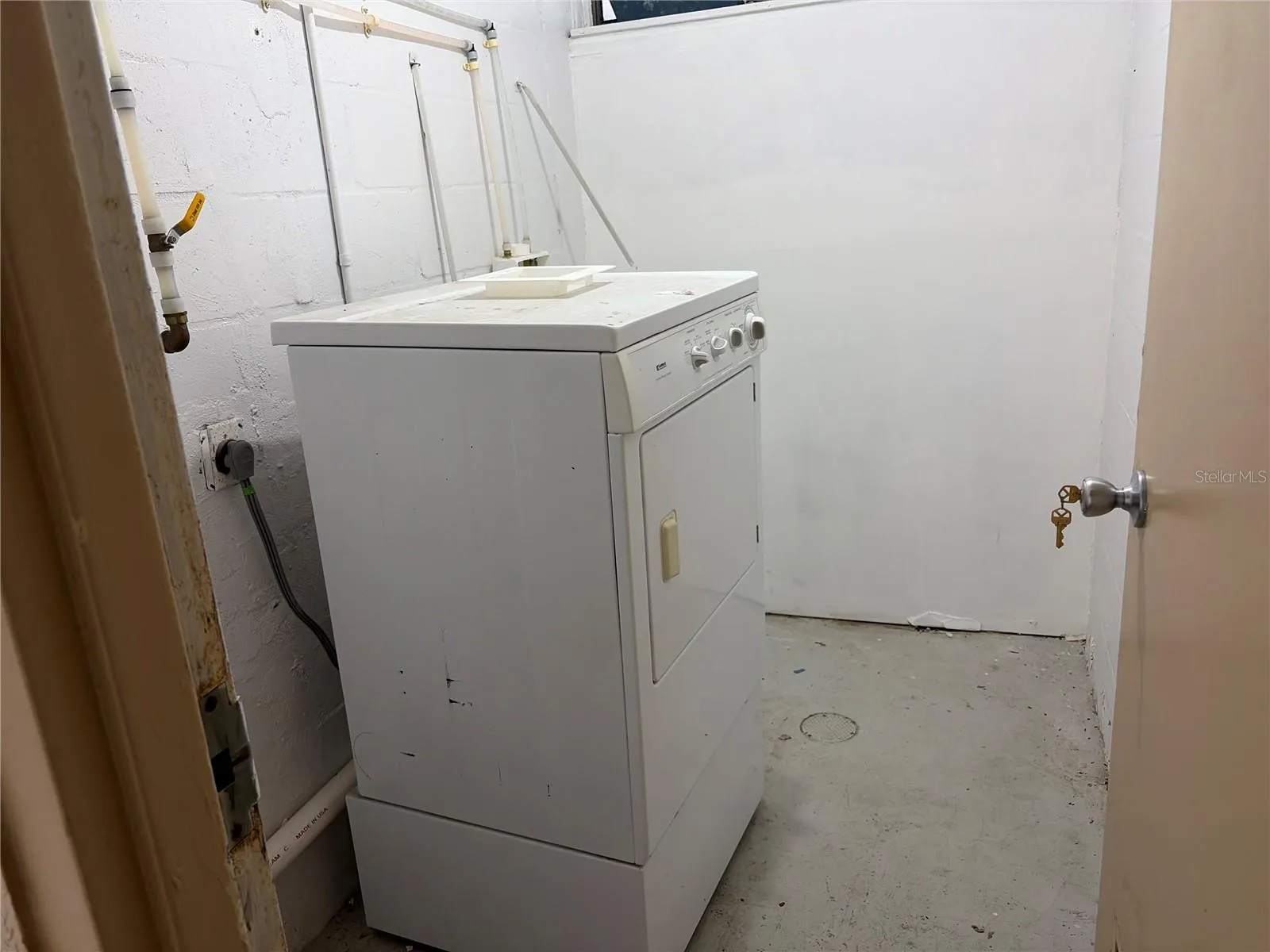 Your private laundry room - located diagonally across from your front entry!