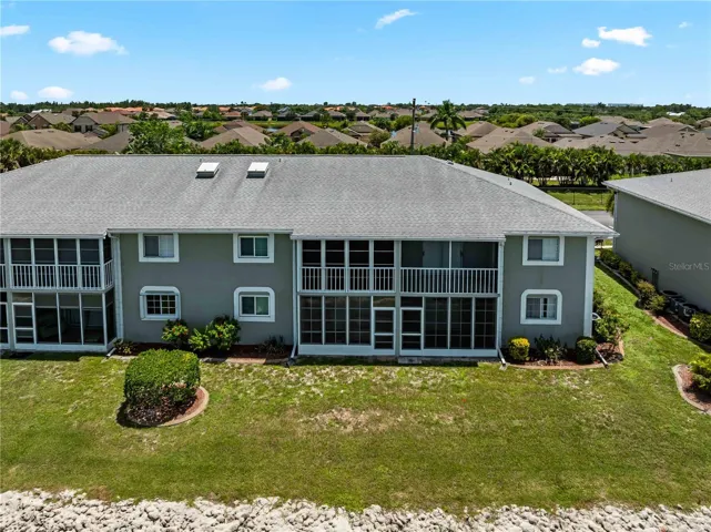 RearExterior_3310LovelandBlvd_PuntaGorda_ScreenedLanai_Overhead.jpg