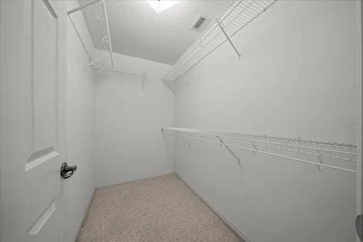 primary walk in closet (upstairs)