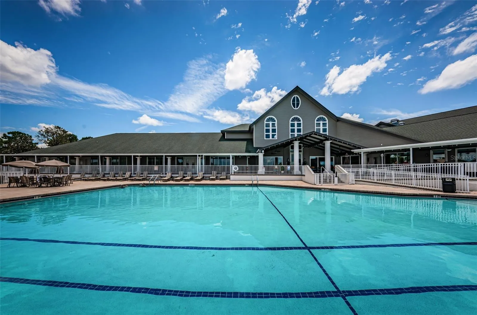 VIEW OF REAR CLUBHOUSE FROM POOL