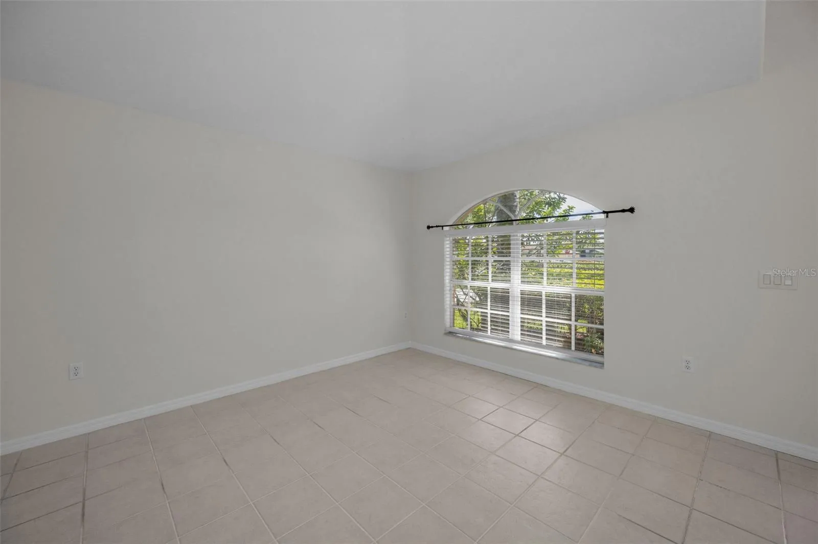 WINDOWED LIVING ROOM IS LIGHT AND BRIGHT