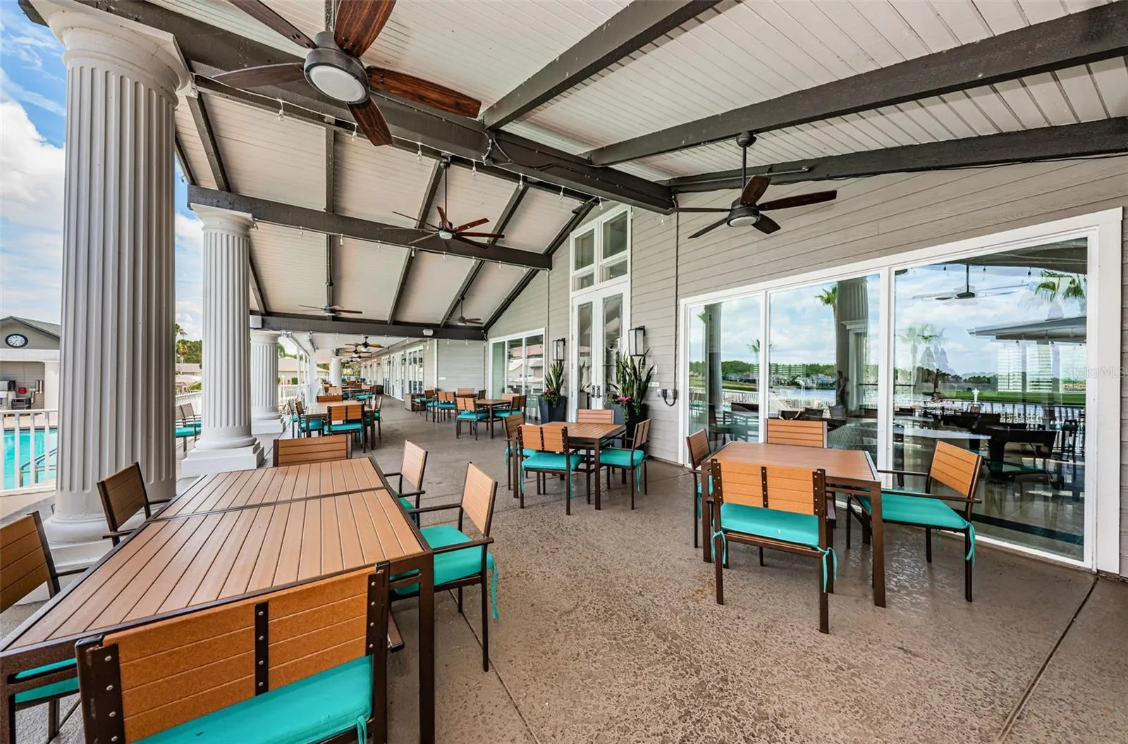 CLUBHOUSE PORCH ADJACENT TO THE RESTAURANT