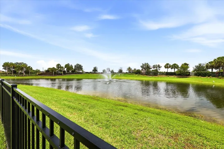 FULLY FENCED YARD ON POND