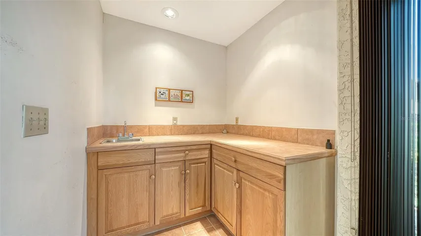 Small wet bar at end of Lania- just add a mini fridge.