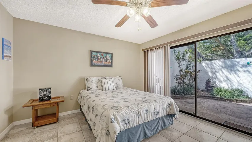 Guest bedroom with view of courtyard