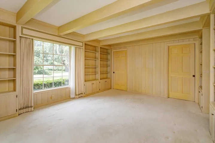 Den/Library has full bath and closet