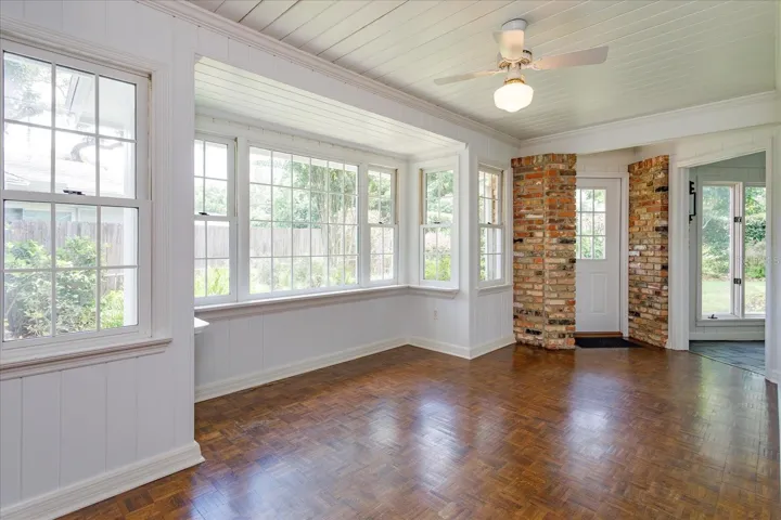 Breakfast Room adjoins Kitchen has door to yard and is open to Florida Room