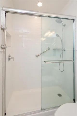 Primary Bath updated step in shower, tile, glass door, faucet