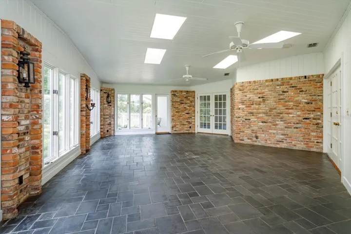 Florida Room has door to yard and open to Kitchen, Family and Breakfast rooms