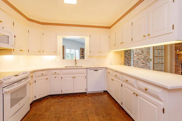 Kitchen has lots of custom cabinet storage