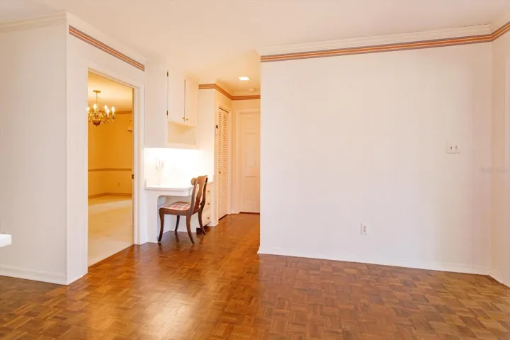 Kitchen has desk, pantry closet, access to Dining a 1/2 Bath and direct access to garage