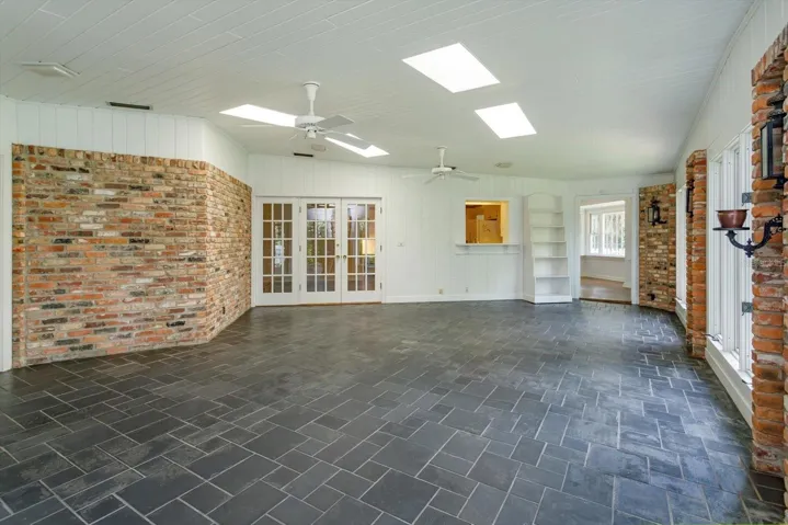 Florida Room has french doors to family room