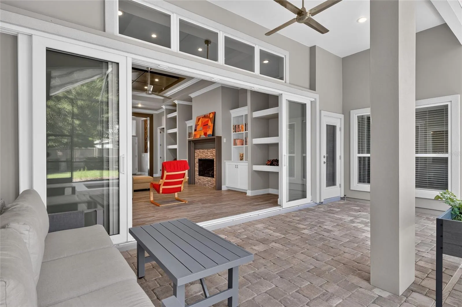 Family room pcoketing sliders to covered lanai