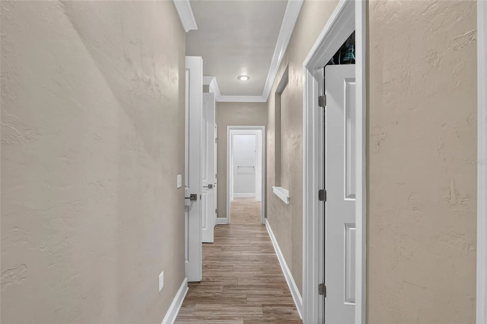 Primary Suite hallway to bathroom