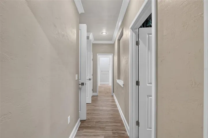 Primary Suite hallway to bathroom