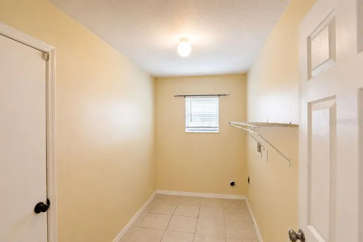 Laundry Room off of Garage and Kitchen
