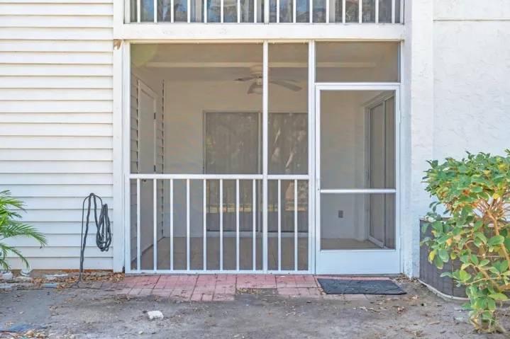 Ground-floor screened lanai entrance — easy outdoor access