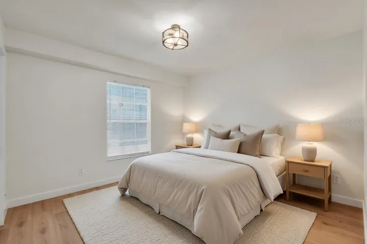 Cozy bedroom with natural light - virtually staged