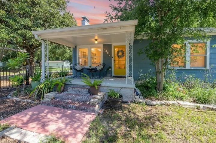 Appealing and welcoming front porch, perfect in a neighborhood known for its Front Porch neighbor gatherings