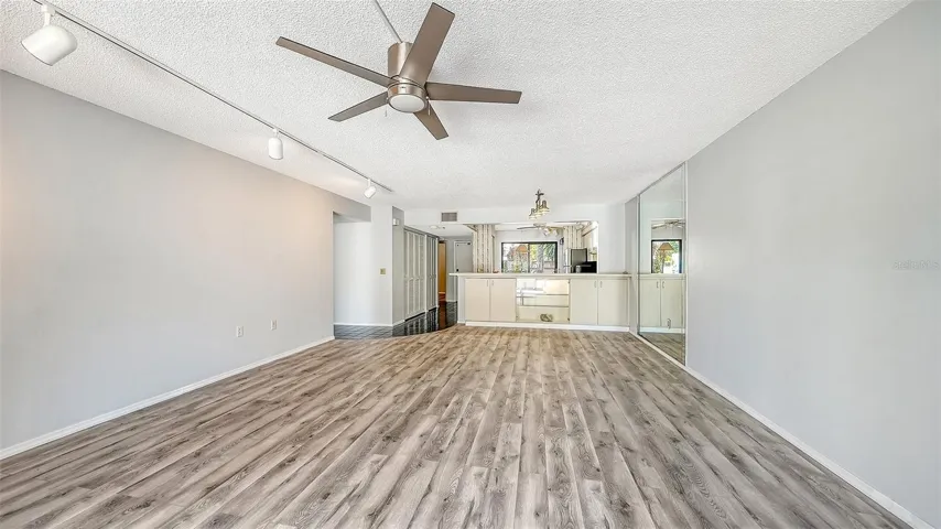 Living room looking back through kitchen slider
