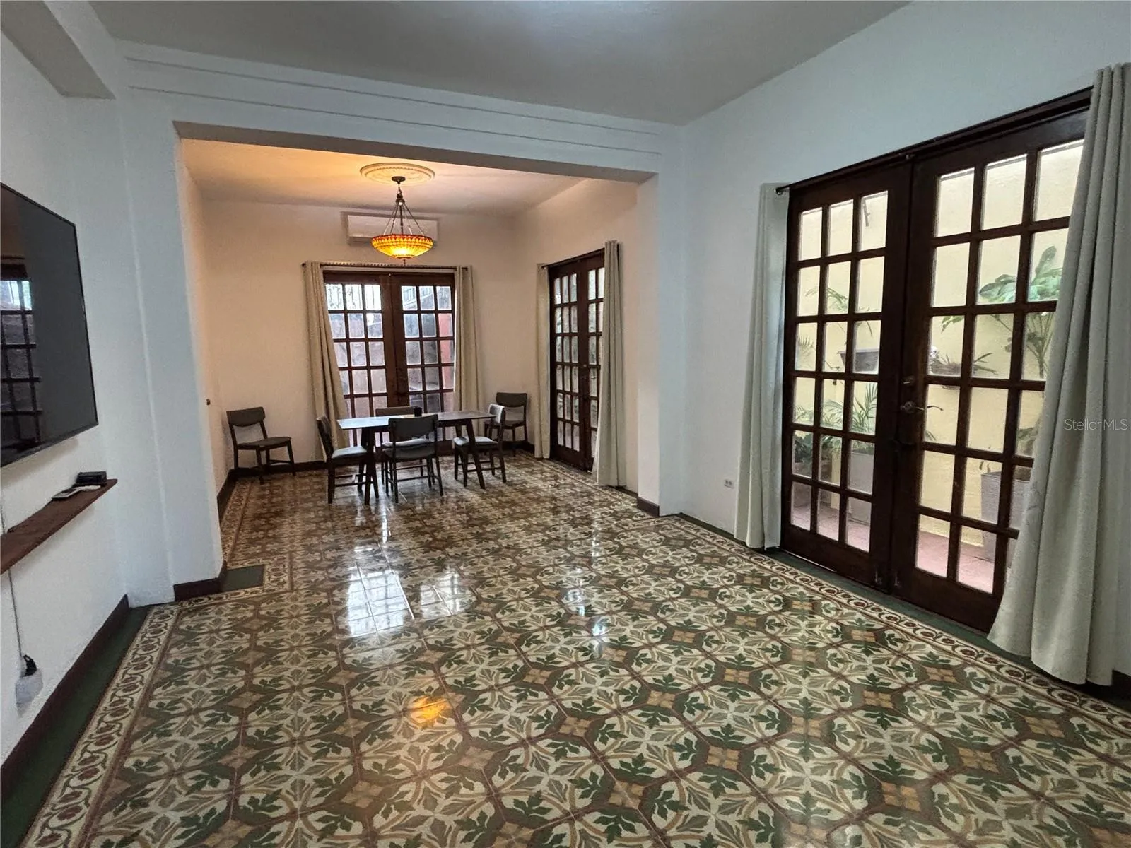 1st floor great room with french doors closed.