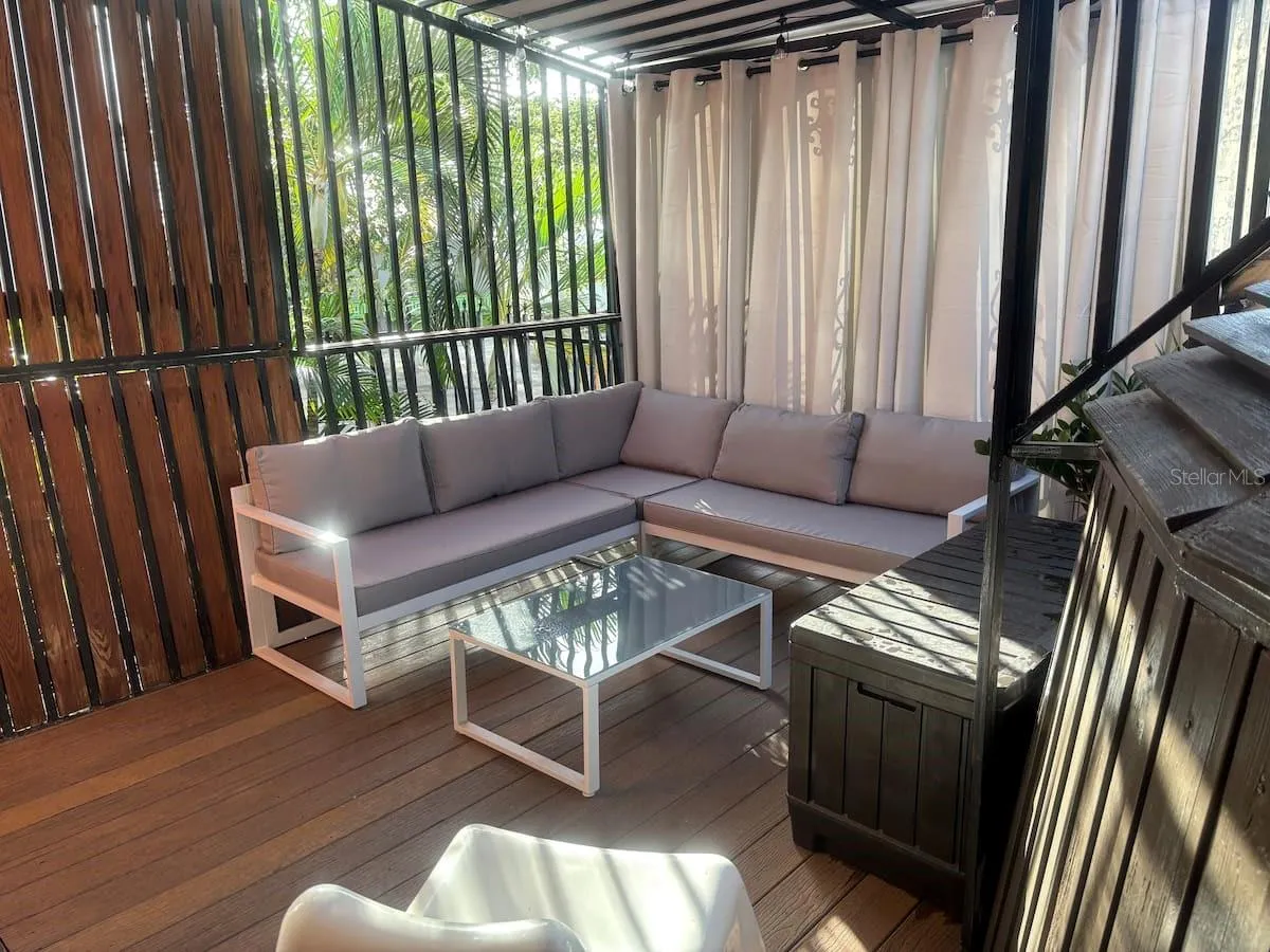 2nd floor rear deck serves as an outdoor living room.