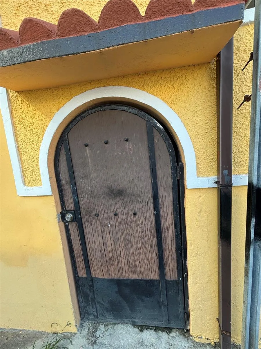 Utility Door at the right of the building is perfect for Propane tank if you want to install a generator or additional water cistern.