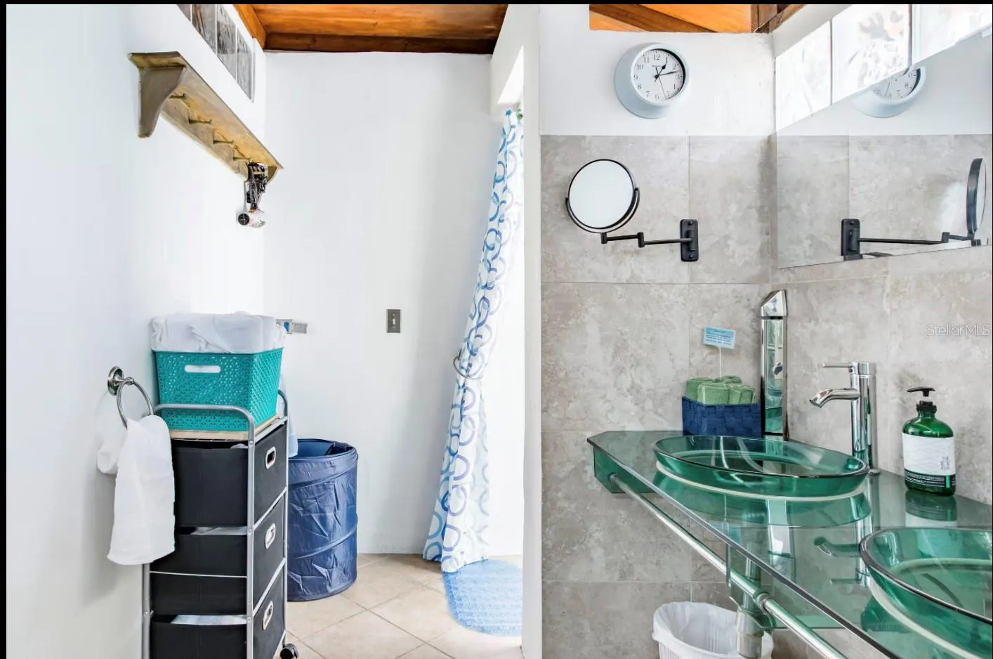 Penthouse bathroom with double sinks.
