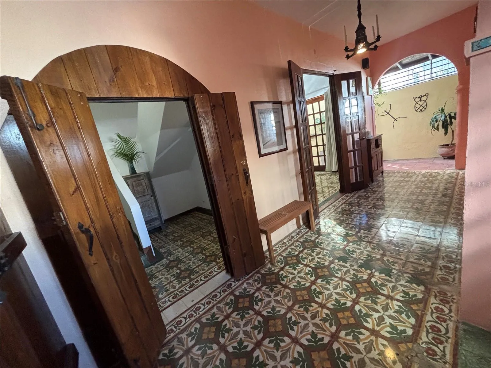 Entry foyer has newly restored antique floor tiles from 1915. These 'creole' tiles are considered museum-quality and highly prized in the few Santurce homes that still have them after 100 years.