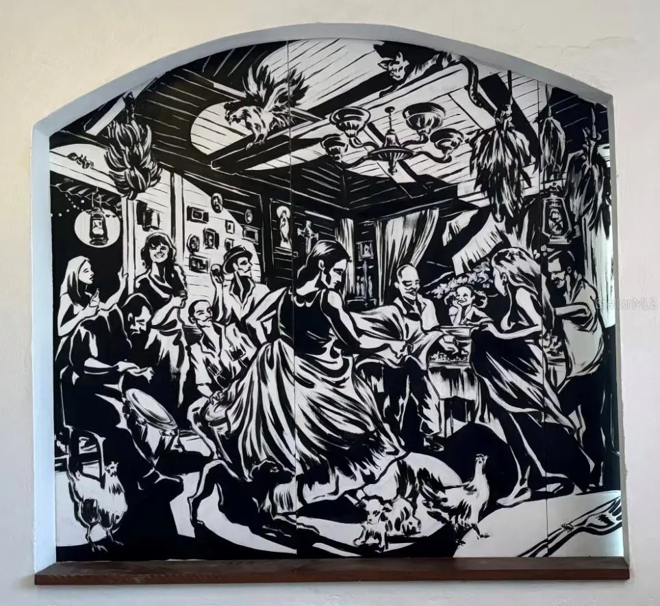 Mural by local artist Sarah Urbain.