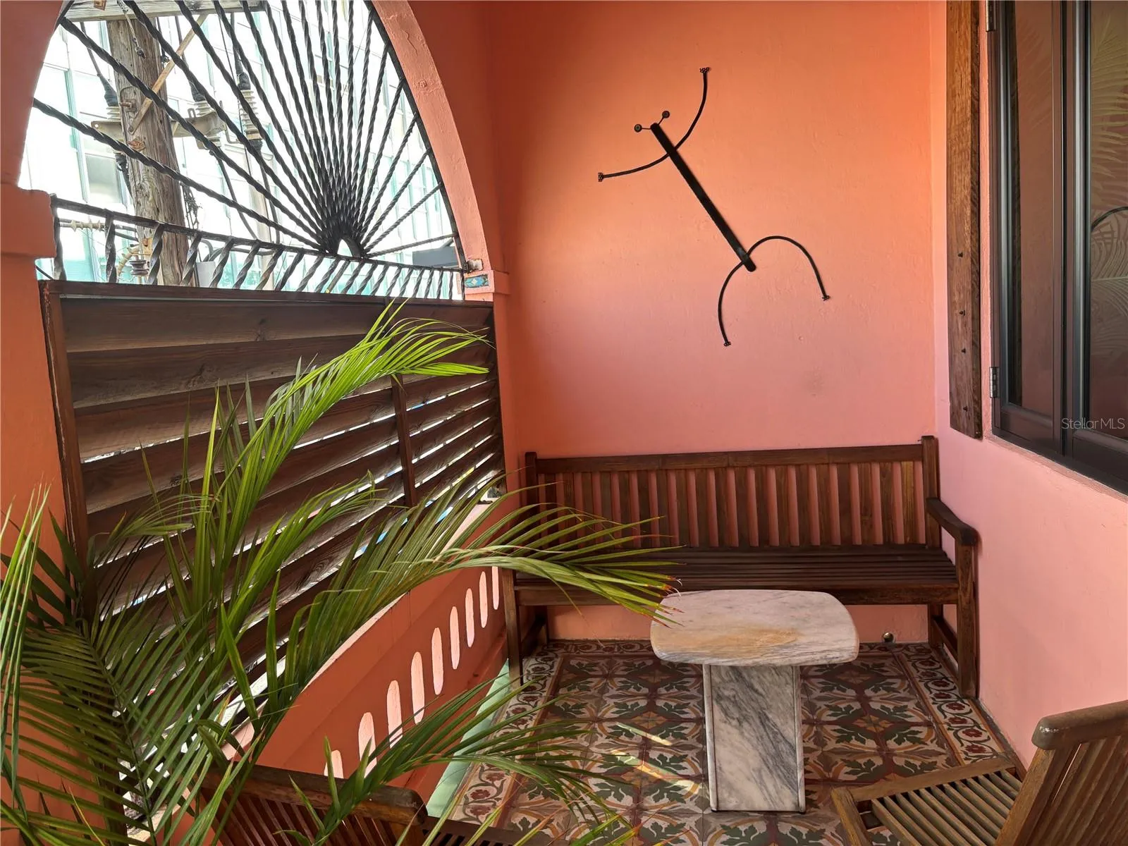 ront balcony with original creole tiles.