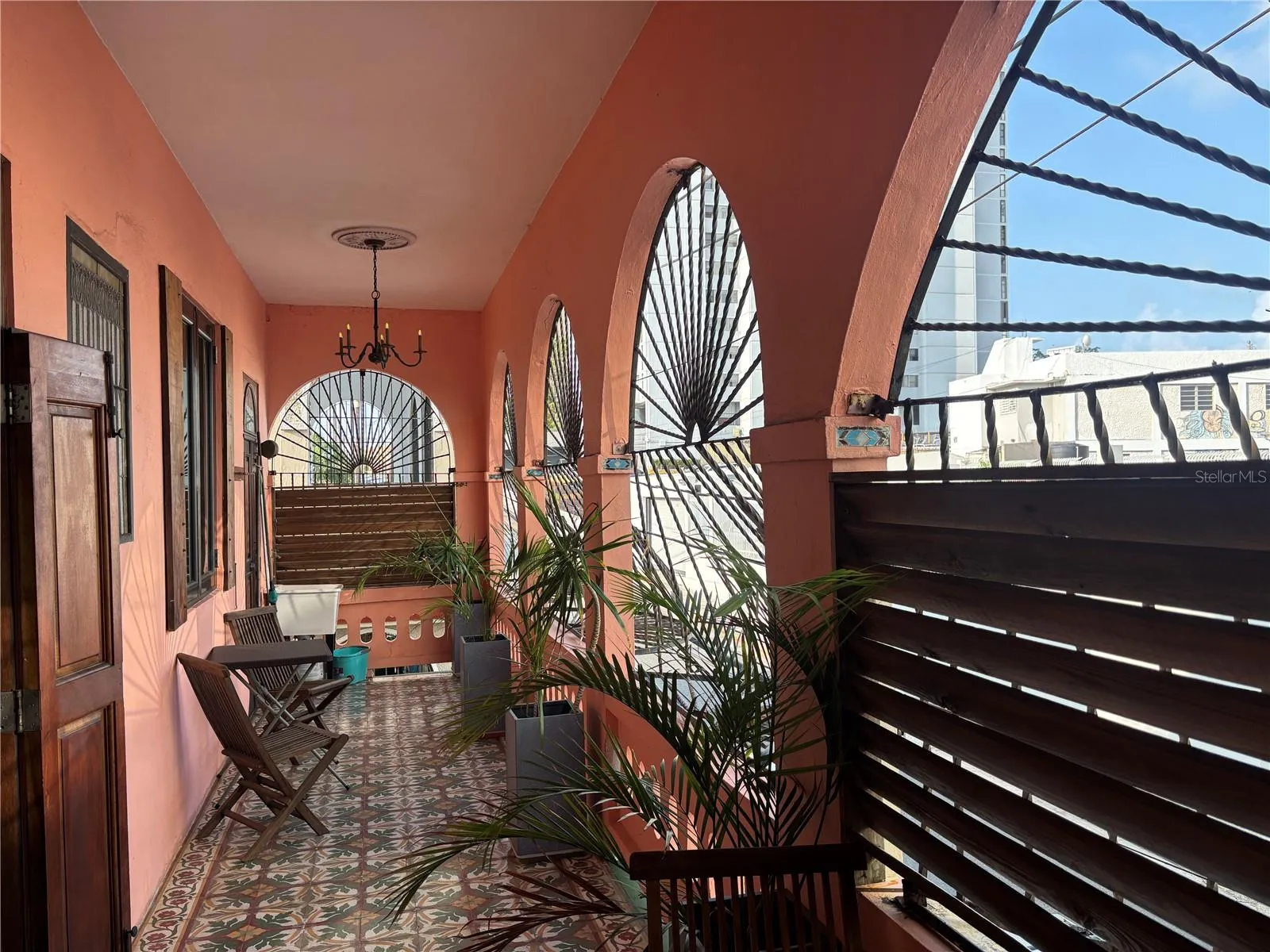 ront balcony with original creole tiles.