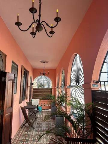 ront balcony with original creole tiles.