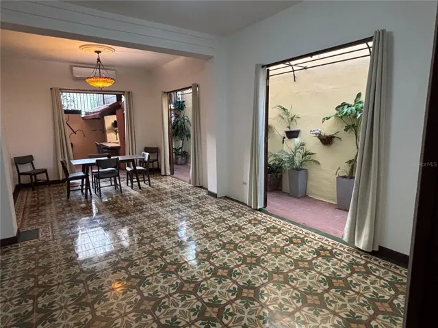 1st floor great room with renovated tiles is great for entertaining!