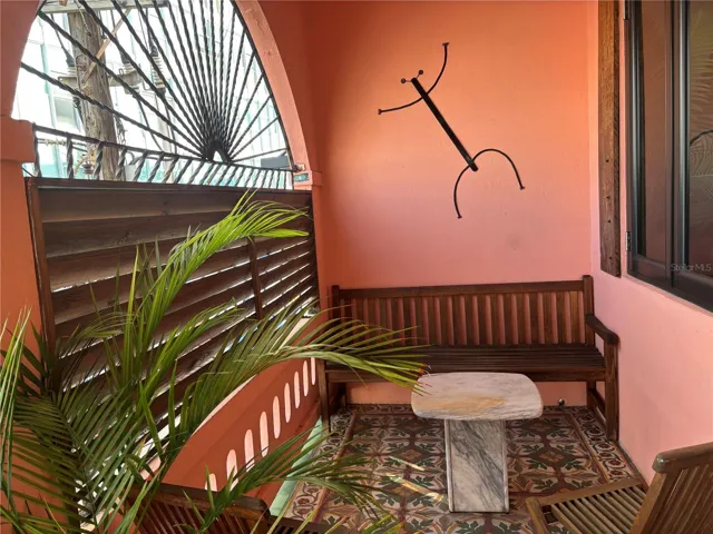 ront balcony with original creole tiles.