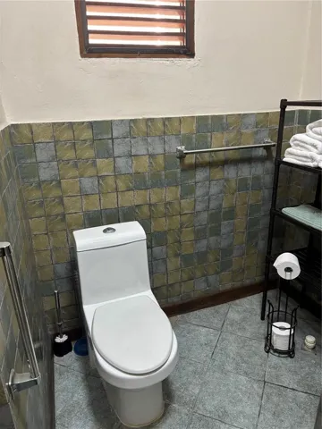 2nd floor bathroom has existing drain if you want to install a soak tub or additional laundry.