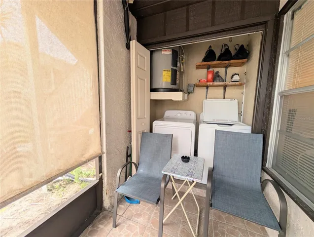 The front patio with the washer and dryer.