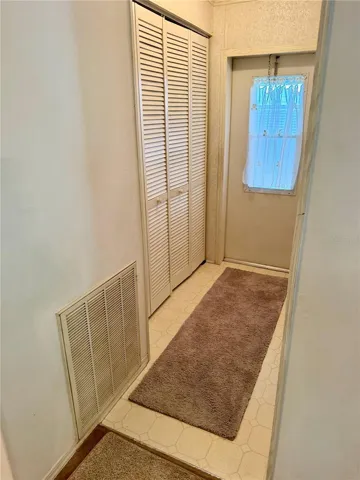 Laundry closet / Hall to screened Lanai