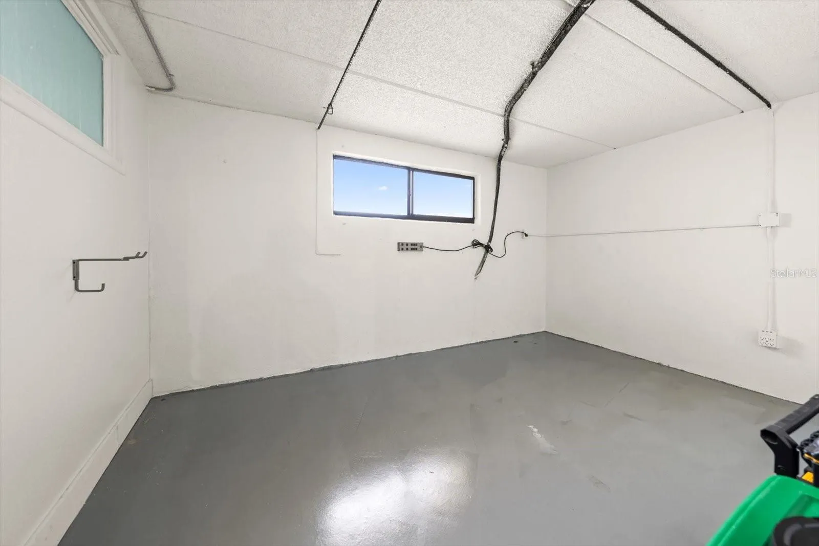 3 Car Garage w/Storage Room