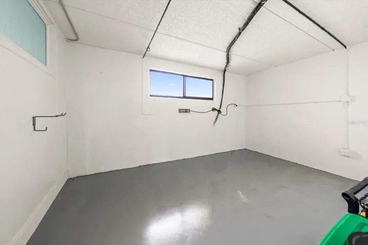 3 Car Garage w/Storage Room
