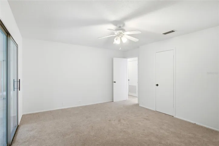 Primary Bedroom w/ greenway views