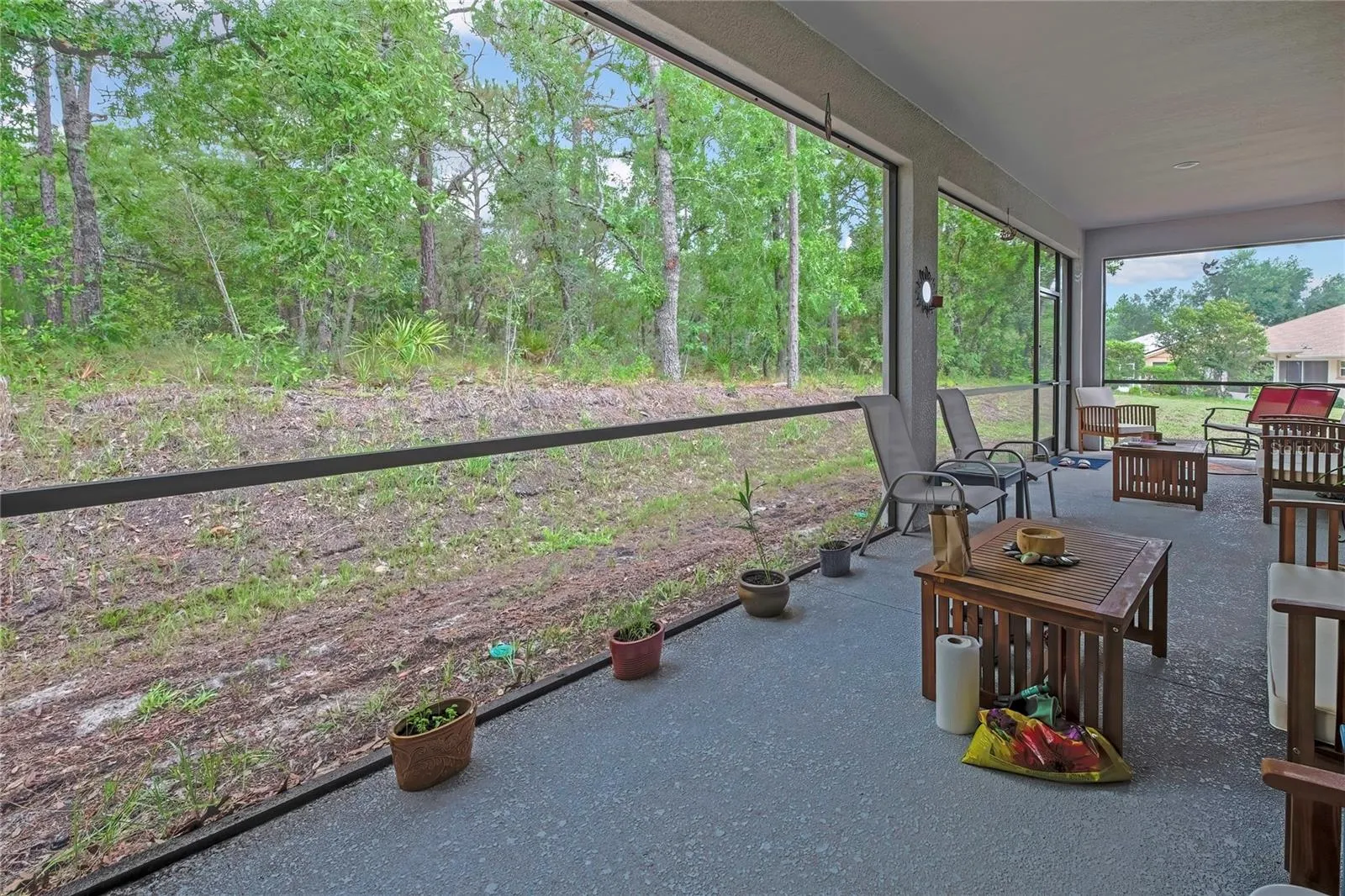 side angle view of screen back porch