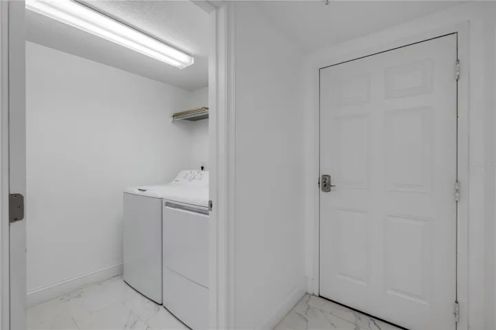 Entry way with laundry room to the right